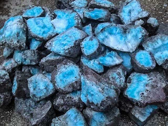 Larimar, a captivating gemstone, is found only in the Dominican Republic. Its unique blue-green hues echo the coral seas of the islands